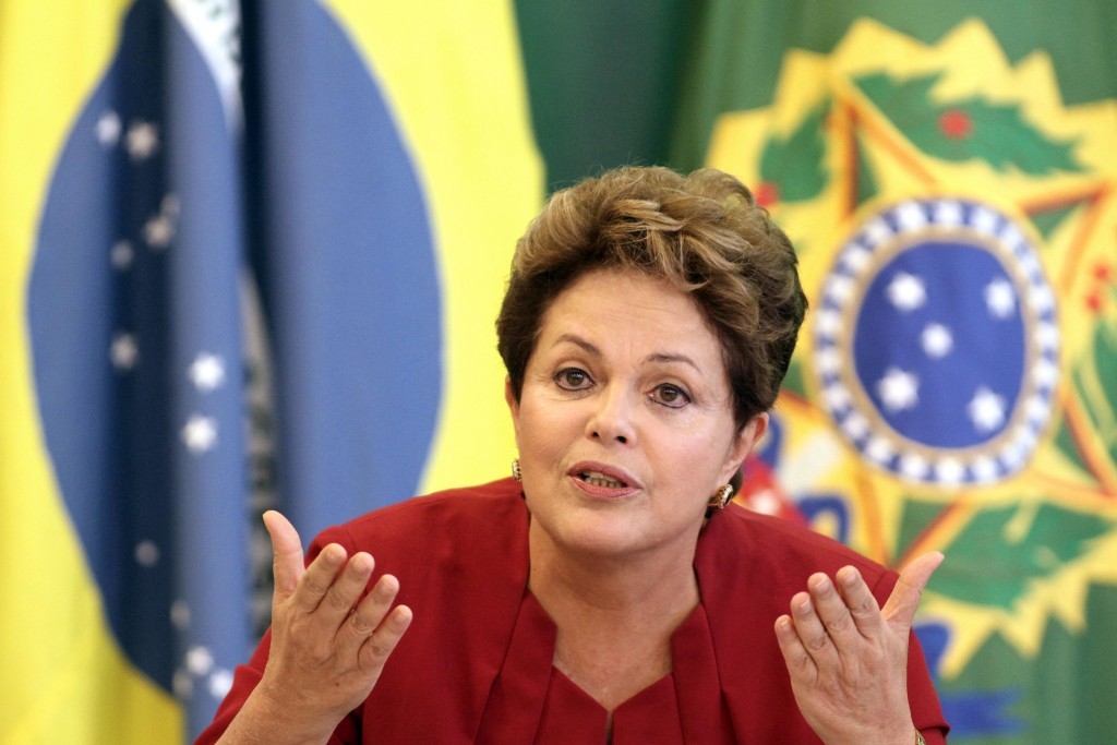 Brazil's President Dilma Rousseff speaks during a breakfast meeting with reporters at the Planalto presidential palace in Brasilia, Brazil, Thursday, Dec. 27, 2012. (AP Photo/Eraldo Peres) Brazil Rousseff